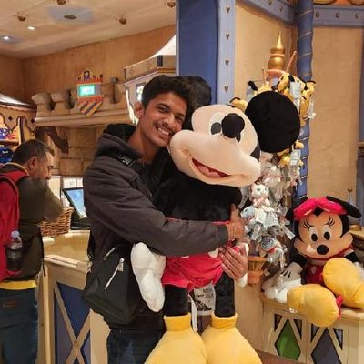 Ridham with Mickey Mouse at Disneyland Paris
