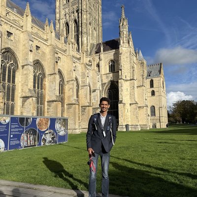 Ridham outside a cathedral on a sunny day